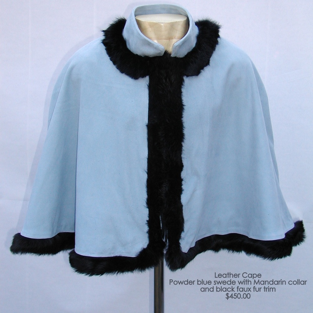 Powder blue Swede cape with black faux fur trim
